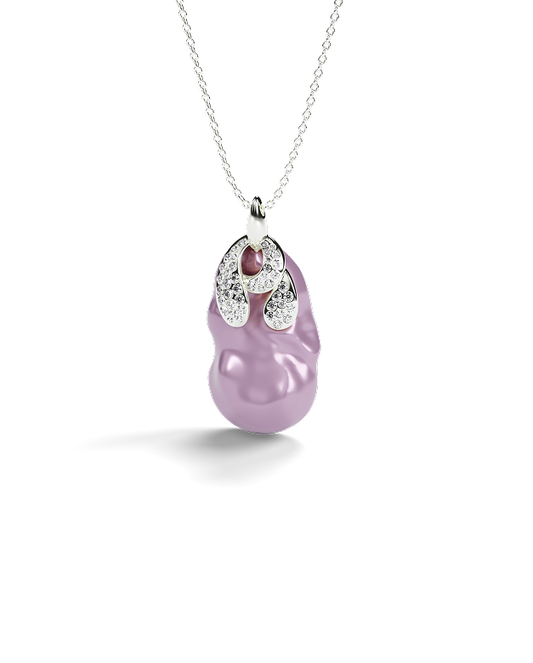 Yellow gold pendant with baroque pearl and pavé white diamonds.