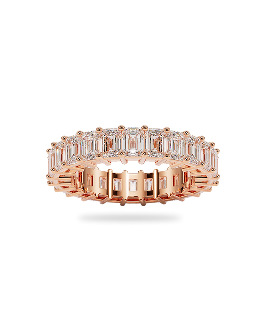 Yellow gold band with emerald cut diamonds
