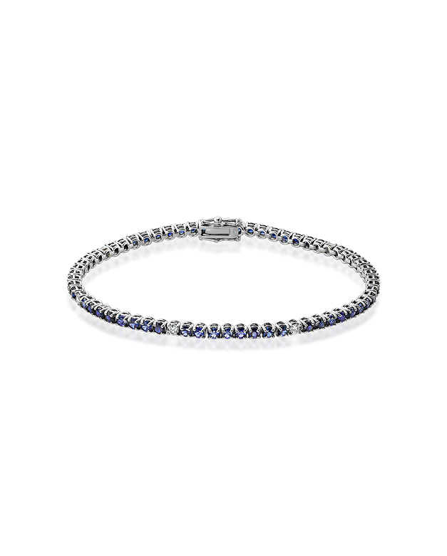 White gold tennis bracelet, set with blue sapphires and diamonds