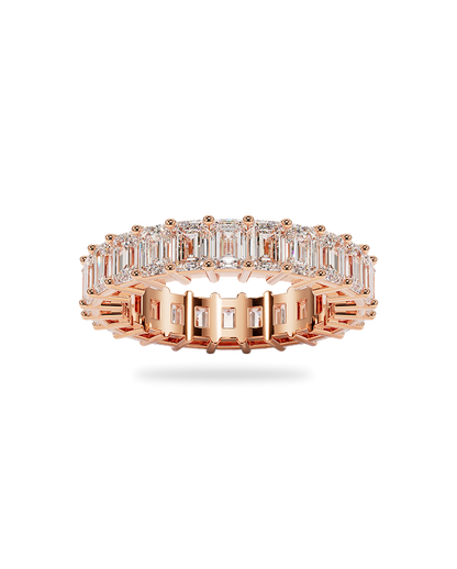 Yellow gold band with emerald cut diamonds