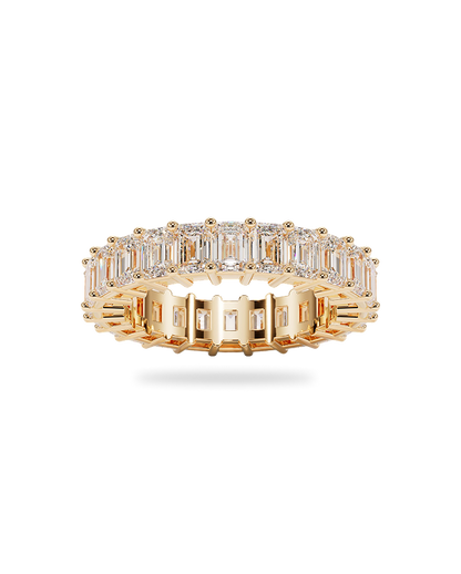 Yellow gold band with emerald cut diamonds
