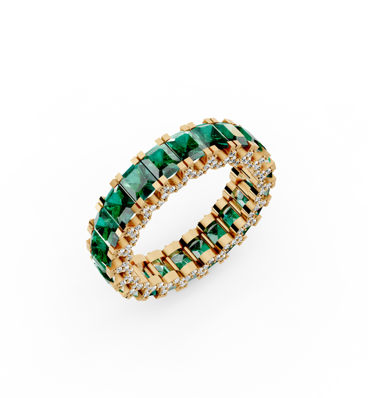Olympia full eternity band featuring a continuous circle of vivid natural Brazilian emeralds bordered by two rows of brilliant diamonds in 18kt gold.