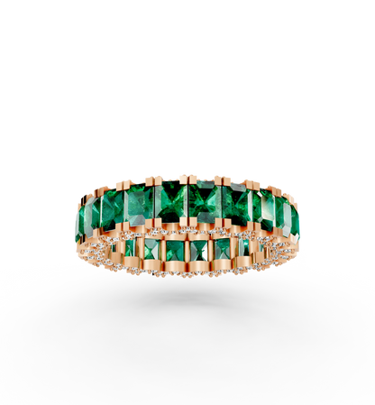 Olympia full eternity band featuring a continuous circle of vivid natural Brazilian emeralds bordered by two rows of brilliant diamonds in 18kt gold.